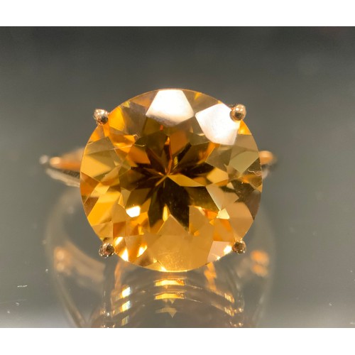 562 - A Gemporia Diamantina Citrine solitaire ring, 8.62ct, 9ct gold shank, size P/Q, 4g gross, with card