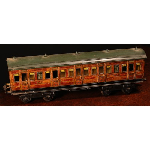 223 - A Gebruder Marklin (Germany) Gauge 1 tinplate first/third passenger coach, G.N.R., No.2875, 44cm lon... 