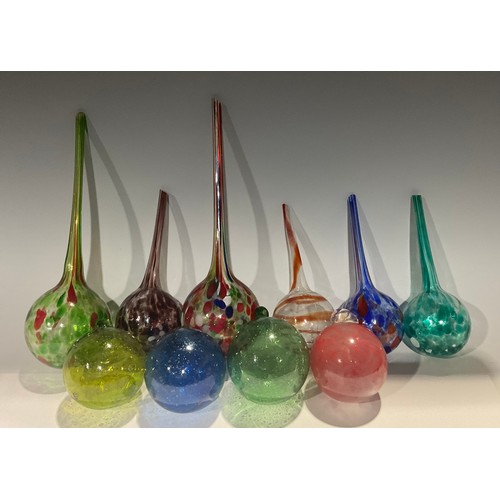 12 - A collection of six free blown glass plant watering globes, various colours and sizes, the largest 3... 