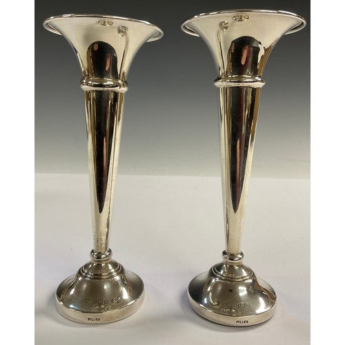 26 - A pair of Elizabeth II silver trumpet shaped specimen vases, Birmingham 1957 - 59