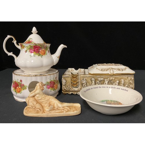 107 - A Capodimonte box; a Royal Albert teapot and stand; an Adams bowl; a reclining figure