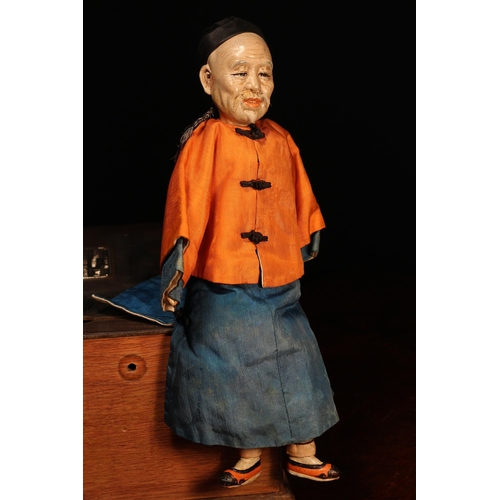 120 - An early 20th century Chinese Door of Hope Mission 'Grandfather' doll, the painted papier-mâché head... 