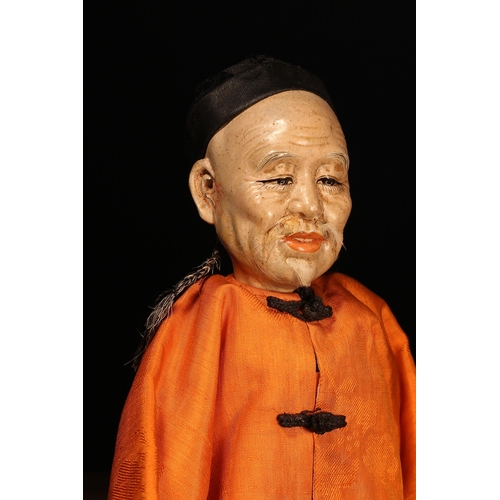 120 - An early 20th century Chinese Door of Hope Mission 'Grandfather' doll, the painted papier-mâché head... 