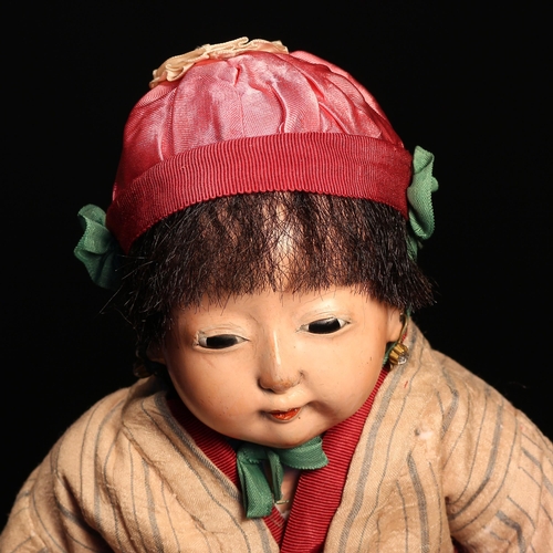 121 - A Japanese gofun Ichimatsu traditional play doll, the gofun head head with inset fixed eyes and pain... 