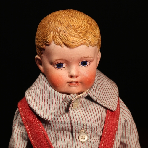 136 - Staffordshire Interest - an early 20th century Caversham Crown Staffs porcelain shoulder head doll, ... 