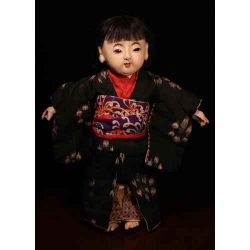 140 - A Japanese gofun Ichimatsu traditional play doll, the gofun head head with inset fixed eyes and pain... 