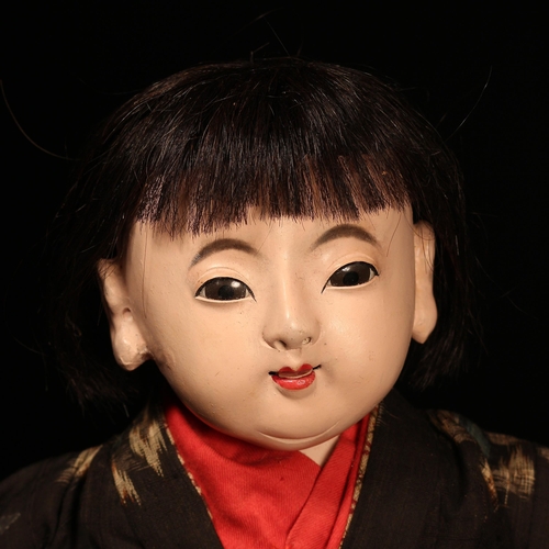 140 - A Japanese gofun Ichimatsu traditional play doll, the gofun head head with inset fixed eyes and pain... 