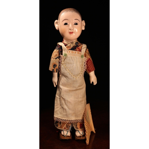 141 - A Japanese gofun Ichimatsu traditional play doll, the gofun head head with inset fixed eyes and pain... 