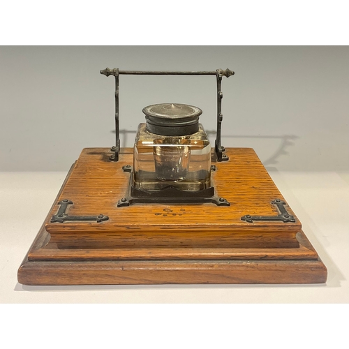 595 - A late Victorian oak inkstand, c.1890