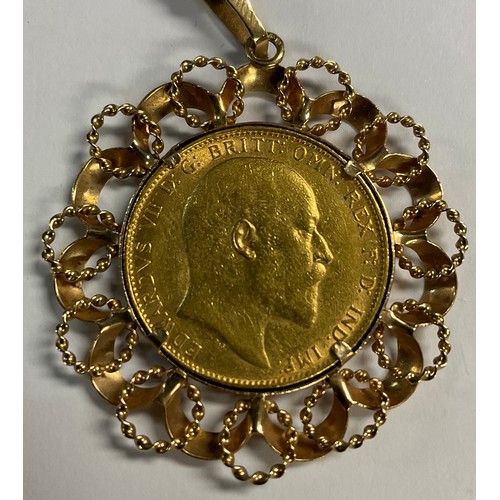 615 - A sovereign, 1907, mounted with a 9ct gold fancy link necklace