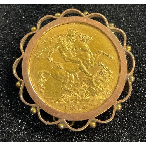 616 - A gold sovereign, 1914, in a mount