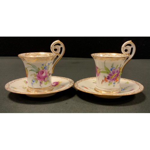 3 - A near pair of 19th Century Dresden Demitasse Cups and Saucers, with ornate gold Quatrefoil detailin... 