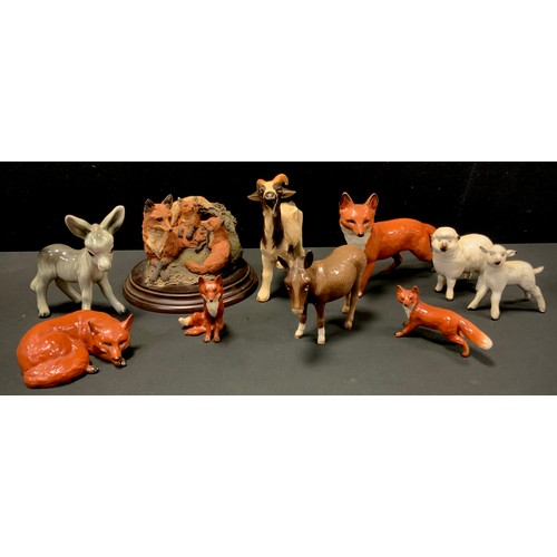 10 - Beswick animals including Mother sheep conforming lamb, foxes, Donkey; etc (9)