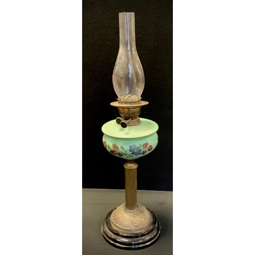19 - A early 20th century hand painted blue milk glass oil lamp on columned stand, swirl base, wooden bas... 