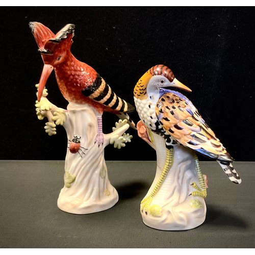 24 - A pair of contemporary Sevres style porcelain figures, as Hoopoe bird and insect, and wadding bird, ... 