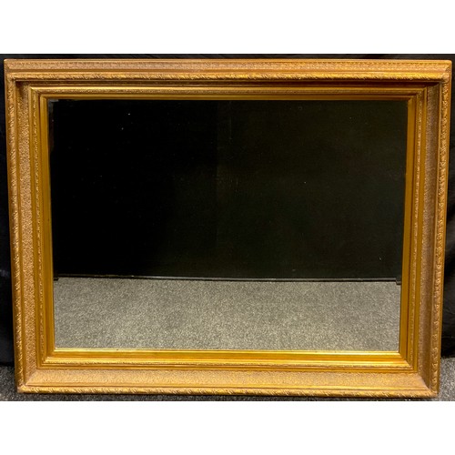 42 - A large ‘gilt’ framed wall mirror, bevelled mirror, 117cm x 148cm overall frame size.