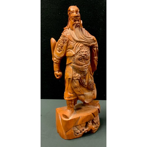 51 - A Chinese carved wooden figure, Samurai Warrior, 59cm high