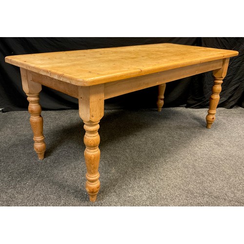 58 - A Farmhouse pine, plank-top dining / kitchen table, rounded rectangular top, turned legs, 77cm high ... 