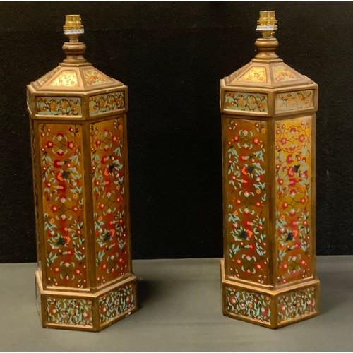 70 - A pair of oriental style hexagonal table lamps, with floral panels and bronze coloured details, 49cm... 