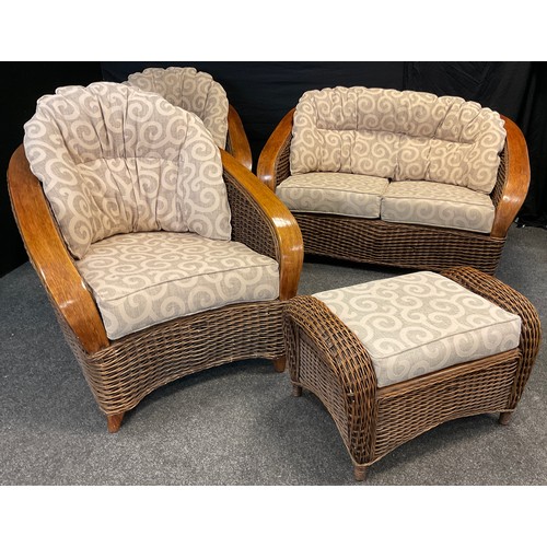 72 - A cane wicker-work conservatory suite - comprised of a two-seat sofa, pair of armchairs, footstool, ... 