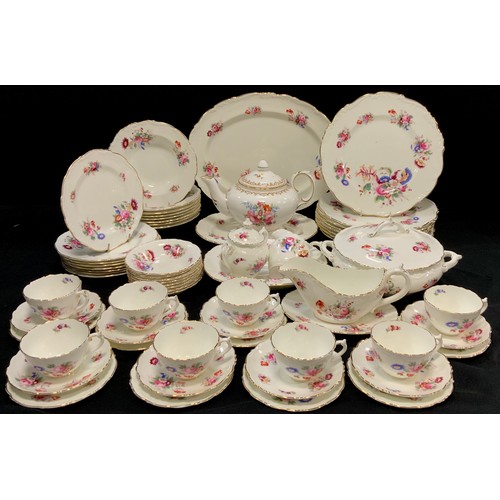 82 - A floral Coalport table service for eight including a tea pot, eight tea cups and saucers, a tureen;... 