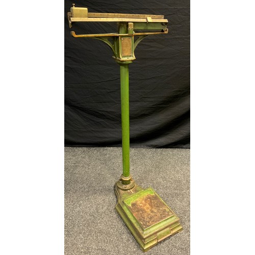 88 - A set of cast iron weighing scales, presented to Woodford R.A.O.B (GLE) convalescent Home by the Por... 