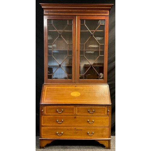 89 - An Edwardian inlaid mahogany bureau bookcase, out swept cornice with inlaid Greek-key decoration, ab... 