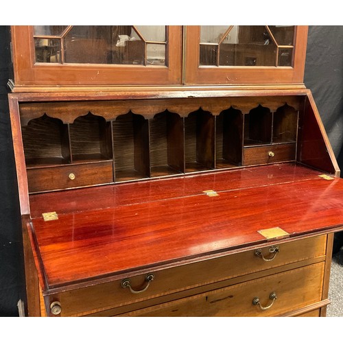 89 - An Edwardian inlaid mahogany bureau bookcase, out swept cornice with inlaid Greek-key decoration, ab... 