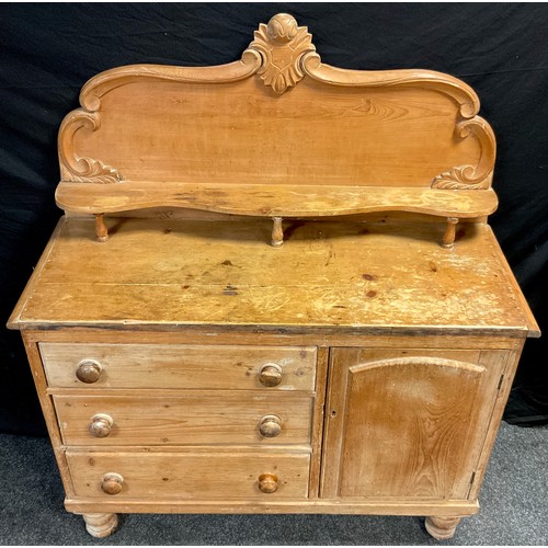 91 - A Victorian pine Lincolnshire dresser, high quarter-galleried back, with carved c-scroll border, and... 