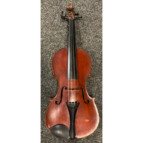 94 - Musical instruments - an early 20th century full size violin, with soft case, and bow;  a BM classic... 