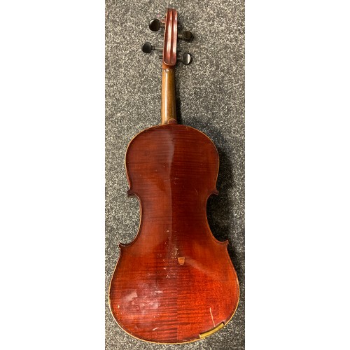 94 - Musical instruments - an early 20th century full size violin, with soft case, and bow;  a BM classic... 