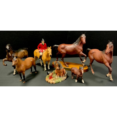 118 - Beswick horses including brown glazed Dartmoor horse,16cm high, Stallion horse, raised hoof, 19cm, o... 