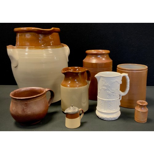 125 - Stoneware including a large 19th century mug,10cm high, twin handled vessel, 30cm high; etc