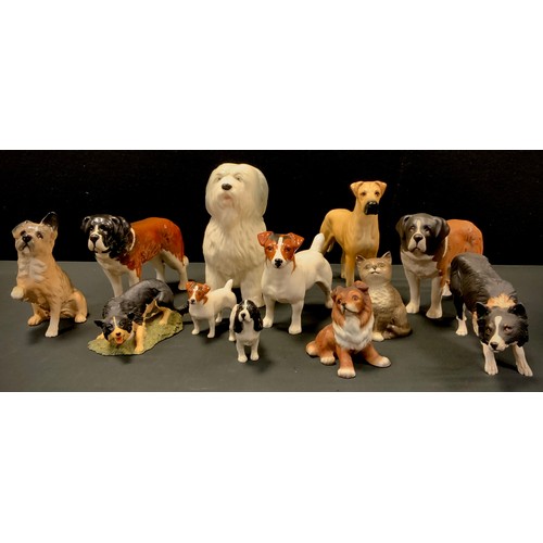 129 - Beswick dogs including Jack Russell's, a pair of 'St Bernard's Corna Garth Stroller 2221, Spaniel, R... 