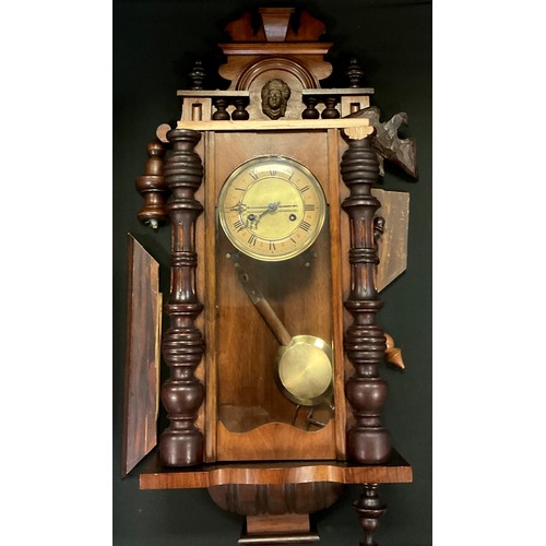 202 - A 20th century wooden wall clock, twin holes, eight-day movement, 53cm high