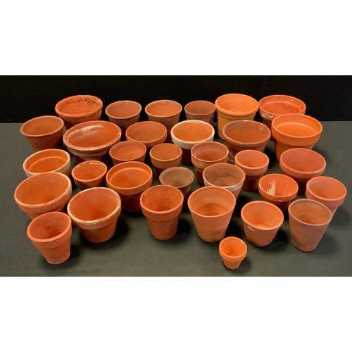 234 - A quantity of small terracotta plant pots, sizes from 13cm high to 5cm high, (32 in total )