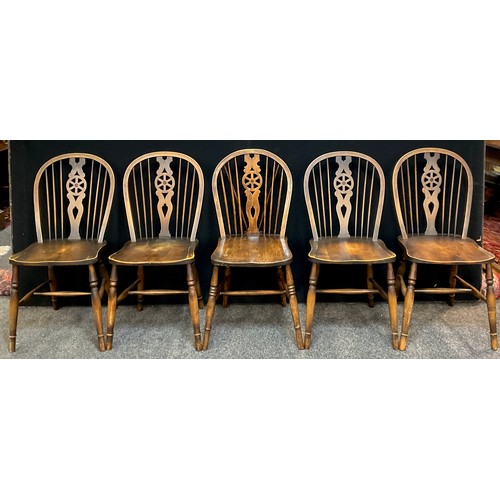 268 - A 19th century Elm spindle-back chair, and a set of four similar 20th century chairs, (5).