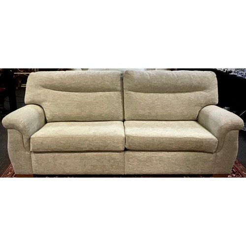 278 - A contemporary three seat sofa, and conforming rise and recline electric armchair, (2).