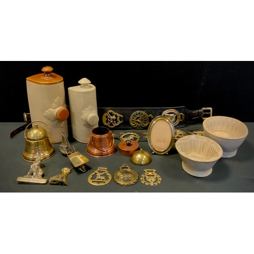 283 - Boxes and Objects - stoneware hot water bottles, Victorian jelly moulds, horse brasses, two bell-sha... 