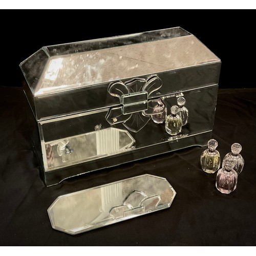 303 - A rectangular mirrored jewellery casket, sloping top, lined interior, 25cm high, 37cm wide, 15cm dee... 