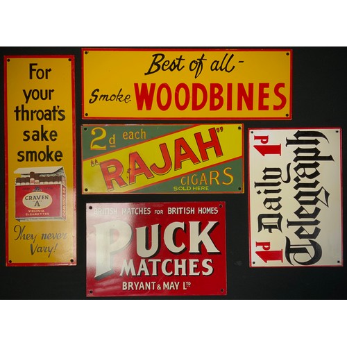 318 - Signs advertising 'The Daily Telegraph', 'Duck Matches', 'Craven A', 'Woodbines' ,'Rajah cigarettes;... 