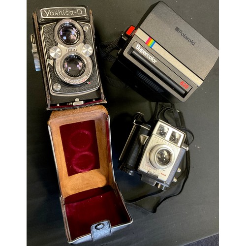 319 - Cameras - a Yashica-D Copal - MXV TLR 120 roll film camera;  Brownie Twin 20 Kodak camera;  Polaroid... 