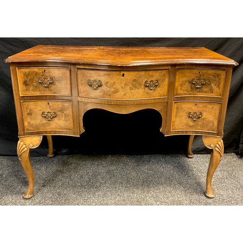 328 - A George III style reproduction dressing table, serpentine shaped front, burr walnut, and walnut cro... 