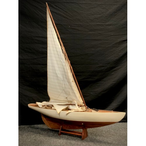 331 - A wooden single mast Yacht, white hull,  approx 115cm x 92cm