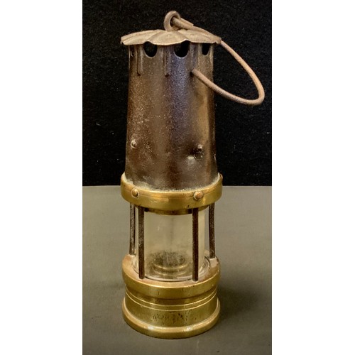 376 - An unnamed iron and brass miners lamp, No.559*, 24cm high