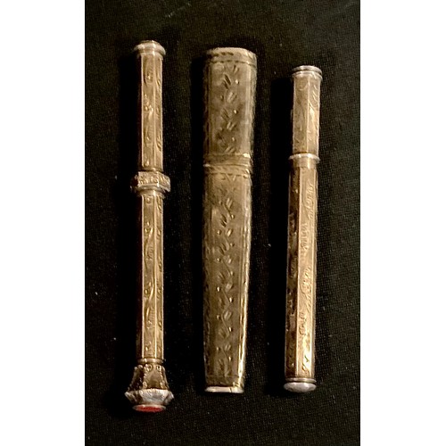 402 - A 19th century silver coloured metal propelling pencil, carnelian terminal; a pencil lead case, simi... 