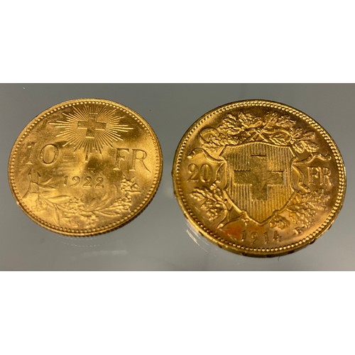 415 - A Swiss Helvetia 20 franc gold coins, dated 1914, another 10 Franc, dated 1922, 9.6g gross (2)