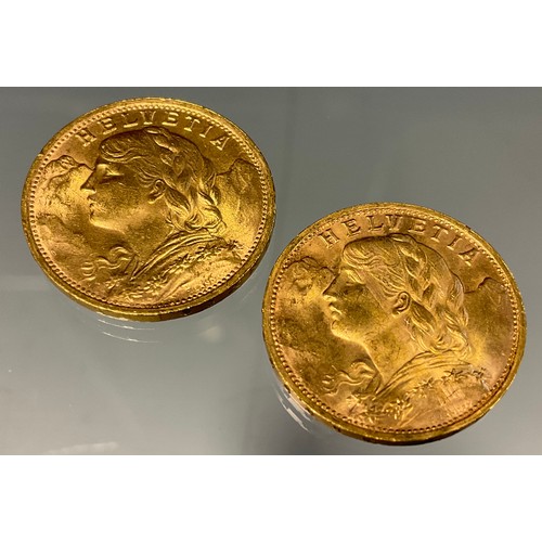 418 - A pair of Swiss Helvetia 20 franc gold coins, both dated 1947, Bern mint, 12.9g gross (2)