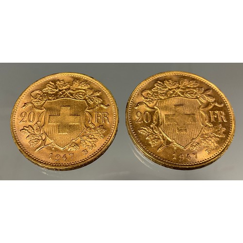 419 - A pair of Swiss Helvetia 20 franc gold coins, both dated 1947, Bern mint, 12.9g gross (2)