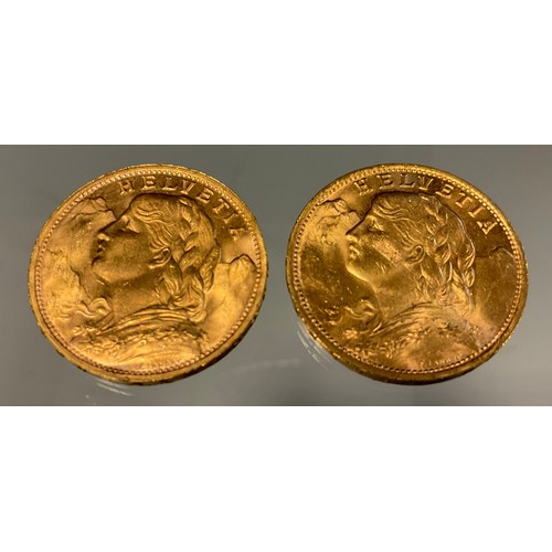 419 - A pair of Swiss Helvetia 20 franc gold coins, both dated 1947, Bern mint, 12.9g gross (2)